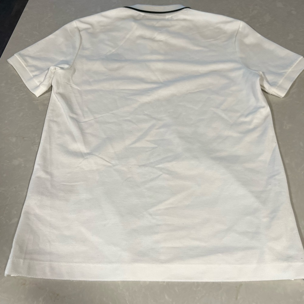 Burberry polo that has never been worn!  Made Portugal with embroidered logo!